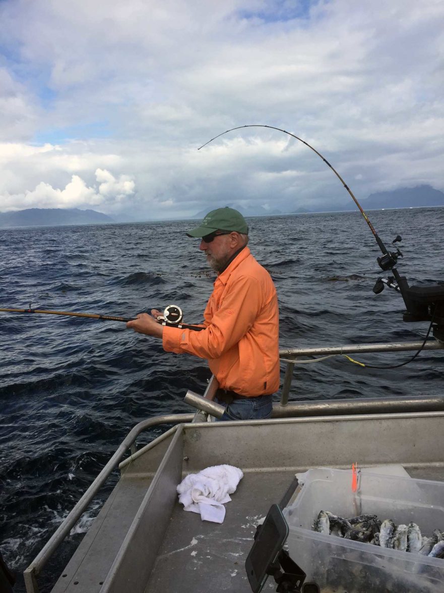 Henry fishing for salmon and halibut in Alaska
